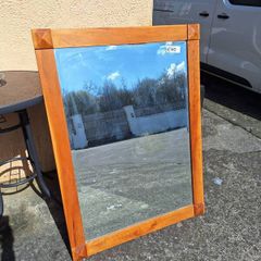 Large wooden bevelled mirror