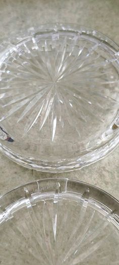 4 DIFFERENT ITMES- 1- Waterford Vintage Glandore Footed Candy Dish/ Compote 38.00 euro. 2- Set of 2 tipperary Vintage crystal Glass Coasters 18.00 euro. 3- Dublin Crystal bud vase 12.00 euro. 4- Nambe Lead Crystal Kissing Candle Sticks New 7 Inches Tall 1