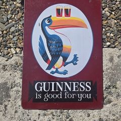 guinness toucan enamel sign