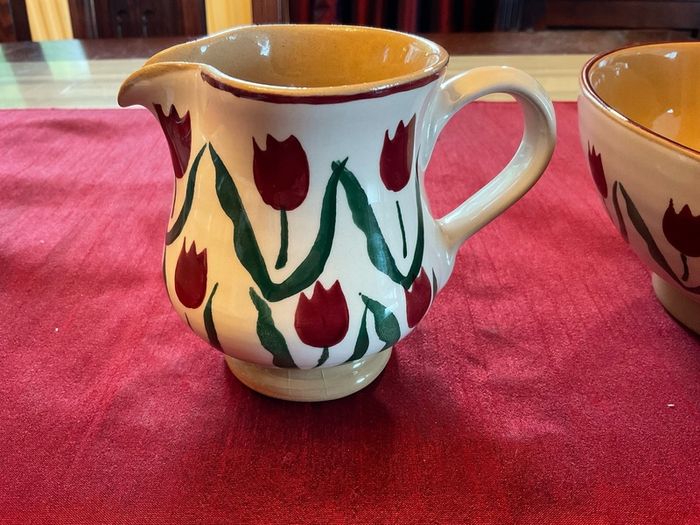 Nicholas Mosse Red lawn set of two , 4 inch jug and a 6 inch diameter bowl . Both have blemishes but perfect for  display