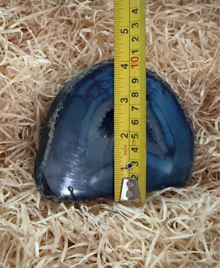 Polished blue agate geode slice.