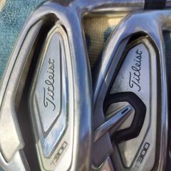 Titleist T300 irons regular.