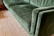 Green velvet sofa