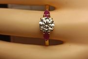 Moissanite Solitaire Ring with Natural Ruby Accents