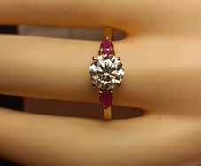 Moissanite Solitaire Ring with Natural Ruby Accents