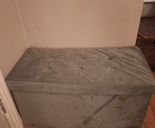 Green velvet bench and storage