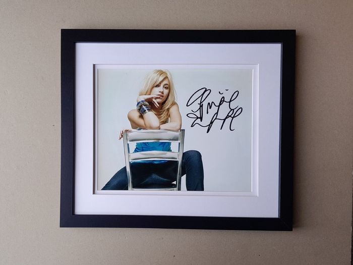 PIXIE LOTT autographed photo in a frame