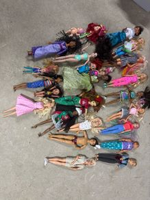 Assortment of Barbie Dolls and Disney princesses