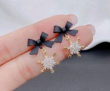 Black bow Christmas earrings