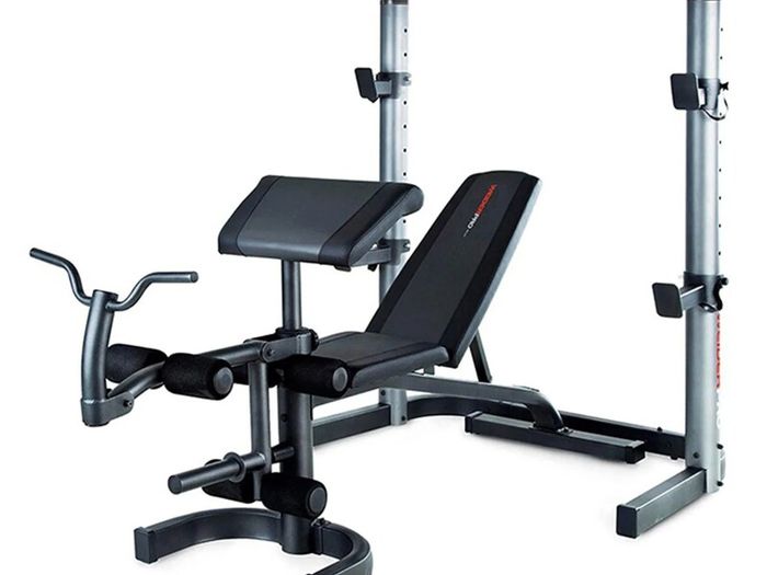 Home Gym Equipment: Adjustable Weider Gym Bench, Olympic bars, and Rubber Weights