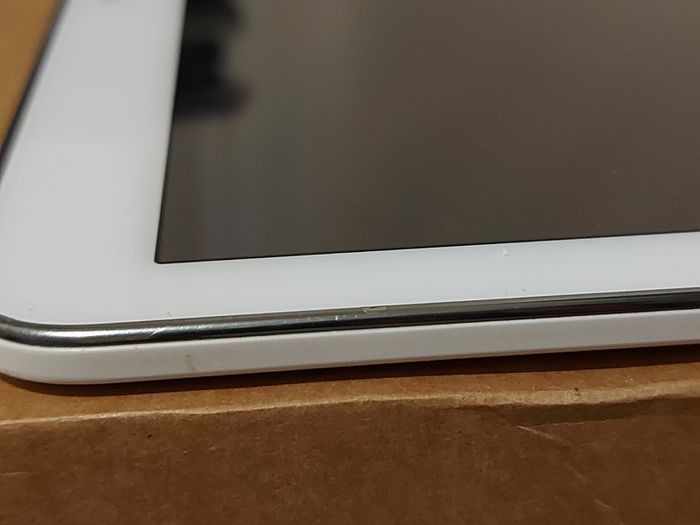 Samsung Galaxy Tab 4, Model SM-T530, 16GB, White, working great, in excellent condition and with a bunch of Family-children  movies