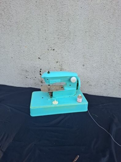 Kid vintage toy sewing machine