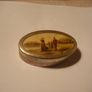 a antique pill box with golfer on it Image 2