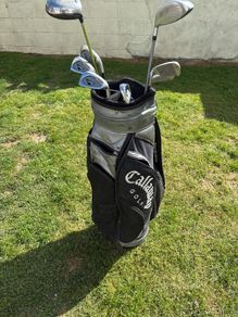 Stalemate golf bag with clubs inside