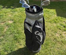Stalemate golf bag with clubs inside