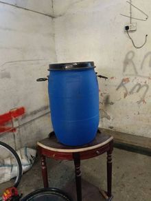 Blue plastic barrells,