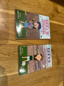 Izzys  Magical adventures Camogie and Football