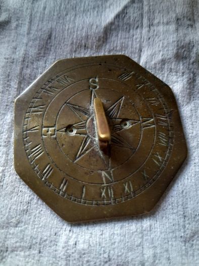 old miniature sundial