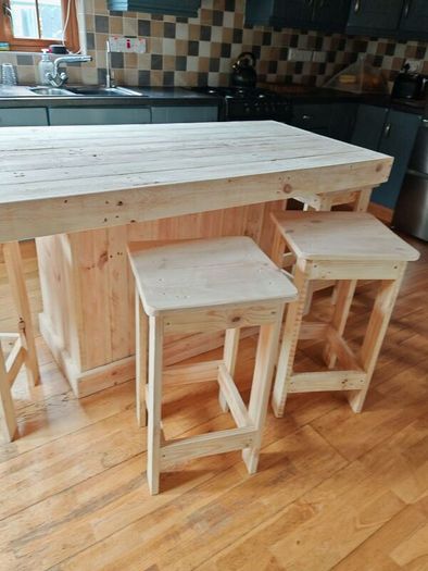 Rustic kitchen island with triple overhang