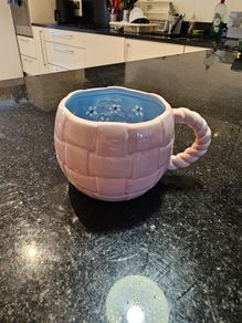 Urban Outfitters Pink Cinnamon Bun Peekaboo Mug