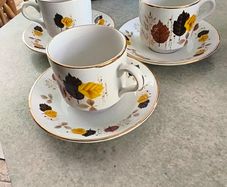 SET Of  3  Arklow Pottery coffee cups and saucers featuring the "Autumn Leaves" pattern.