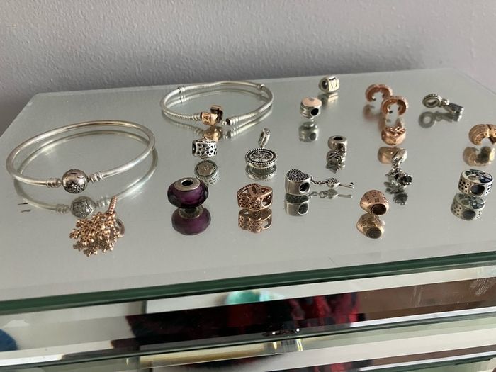 Assorted pandora charms and bracelets