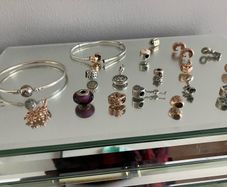 Assorted pandora charms and bracelets