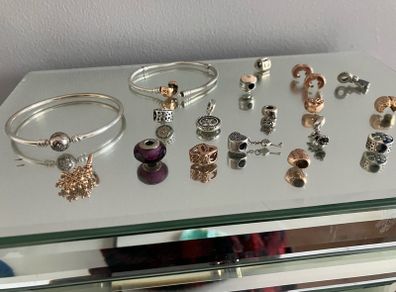 Assorted pandora charms and bracelets