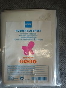 Rubber cot sheet.
