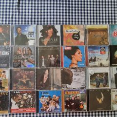 153 CDs with various music.