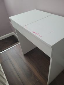 White vanity table with flip-top mirror
