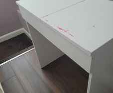 White vanity table with flip-top mirror