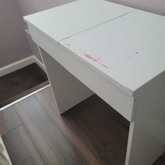 White vanity table with flip-top mirror