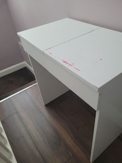 White vanity table with flip-top mirror