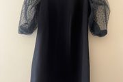 Dress with detail on sleeves