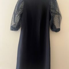 Dress with detail on sleeves
