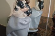 Vintage Nao by Lladro. Girl holding Sleepy Puppy. 1987.  #1029