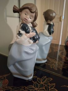Vintage Nao by Lladro. Girl holding Sleepy Puppy. 1987.  #1029