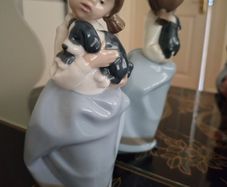 Vintage Nao by Lladro. Girl holding Sleepy Puppy. 1987.  #1029