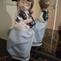 Vintage Nao by Lladro. Girl holding Sleepy Puppy. 1987.  #1029