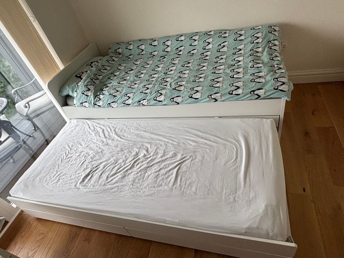 IKEA bed frame with pull-out underbed and storage with Mattresses