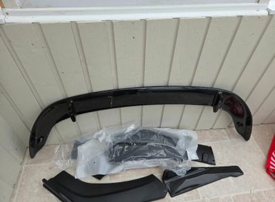 Boot spoiler and side skirts for BMW