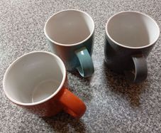 Three large coloured mugs