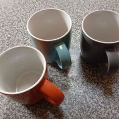 Three large coloured mugs