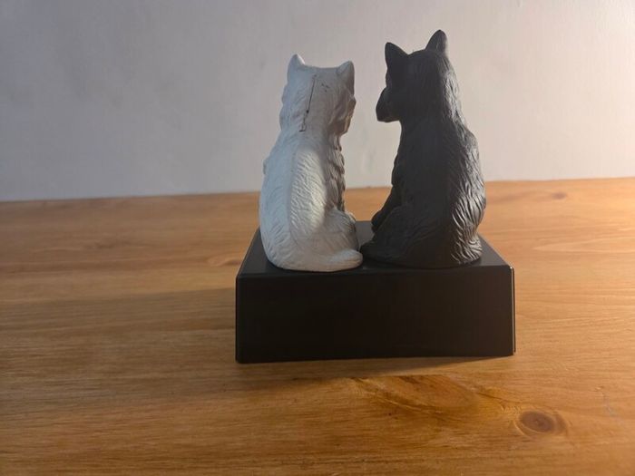 Black and white whiskey statue