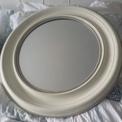 Cream round mirror