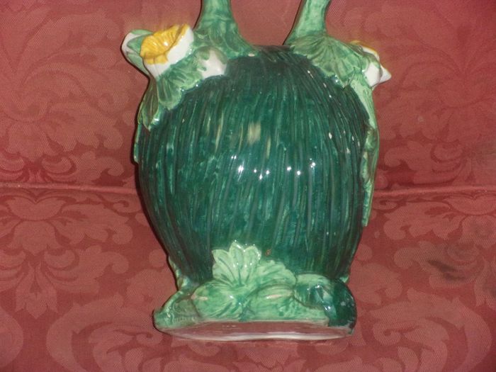 antiques majolia water jug in the shape of a mellan