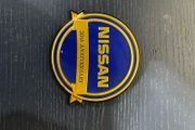 Nissan 50th Anniversary badge