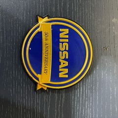 Nissan 50th Anniversary badge