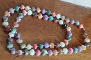 Necklace of multicolored artificial stones.